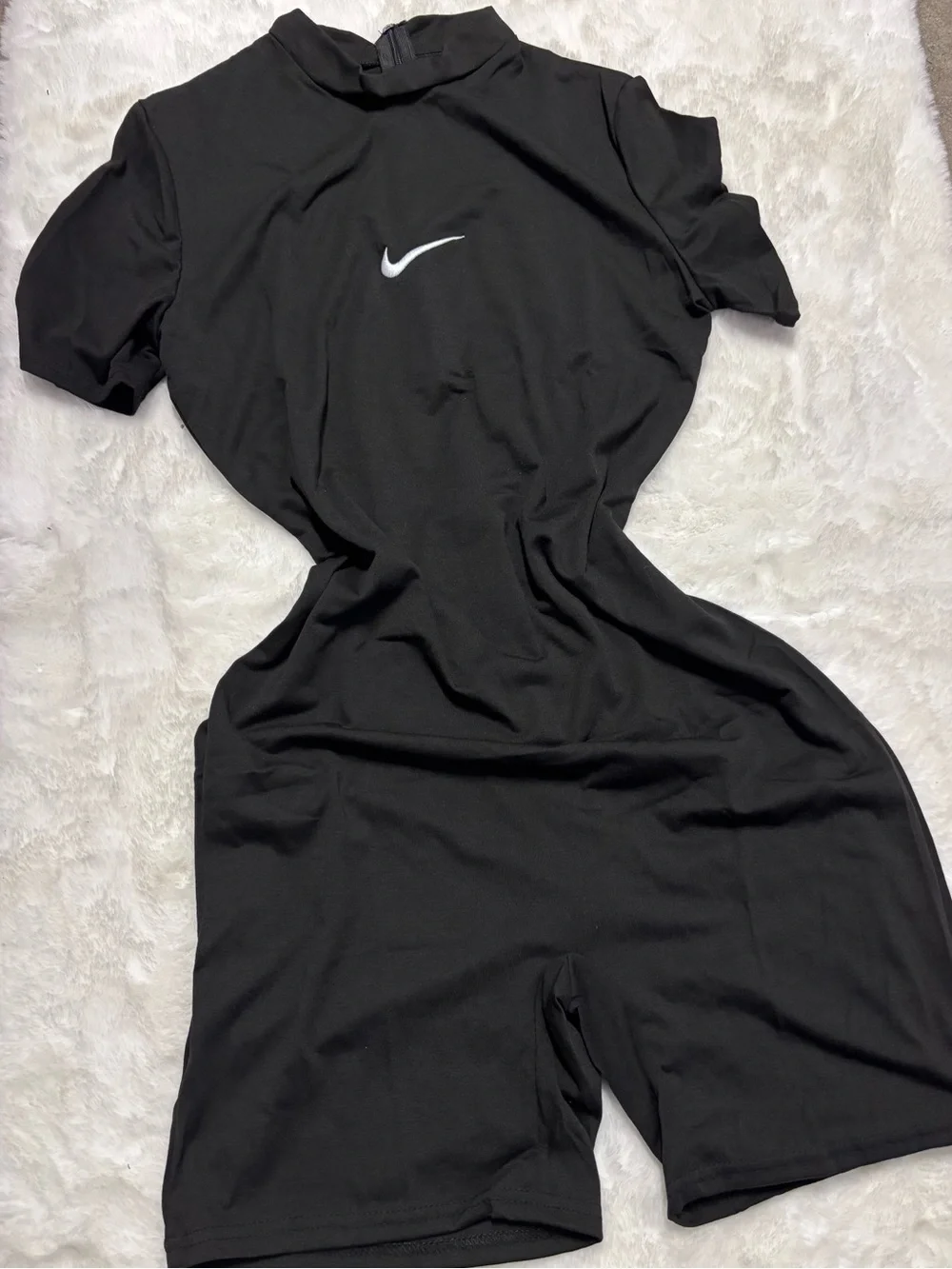 Nike Black Short-Sleeve Athletic Romper with White Swoosh - Picture 1 of 2